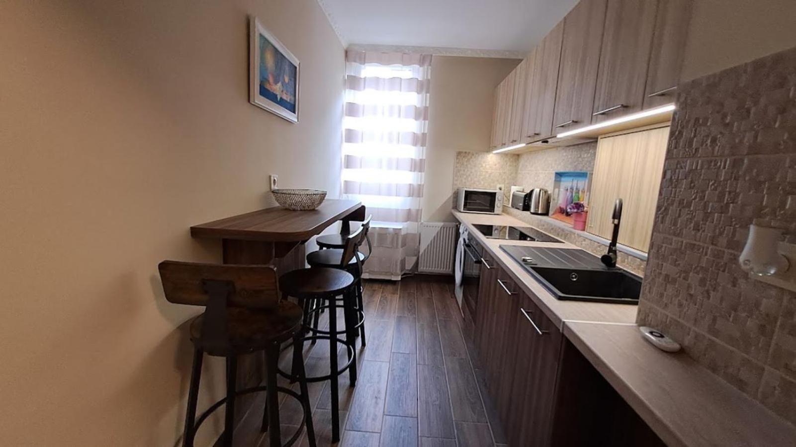 Szilfak City Apartman Хайдусобосло Экстерьер фото